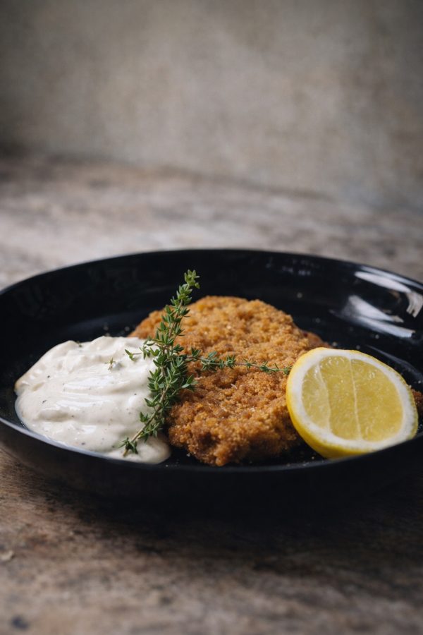 Breaded pork fillets with yogurt, lemon & fresh thyme sauce