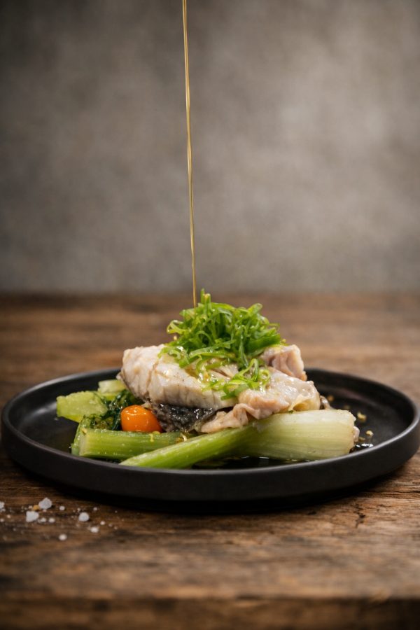 Poached croaker with vegetables